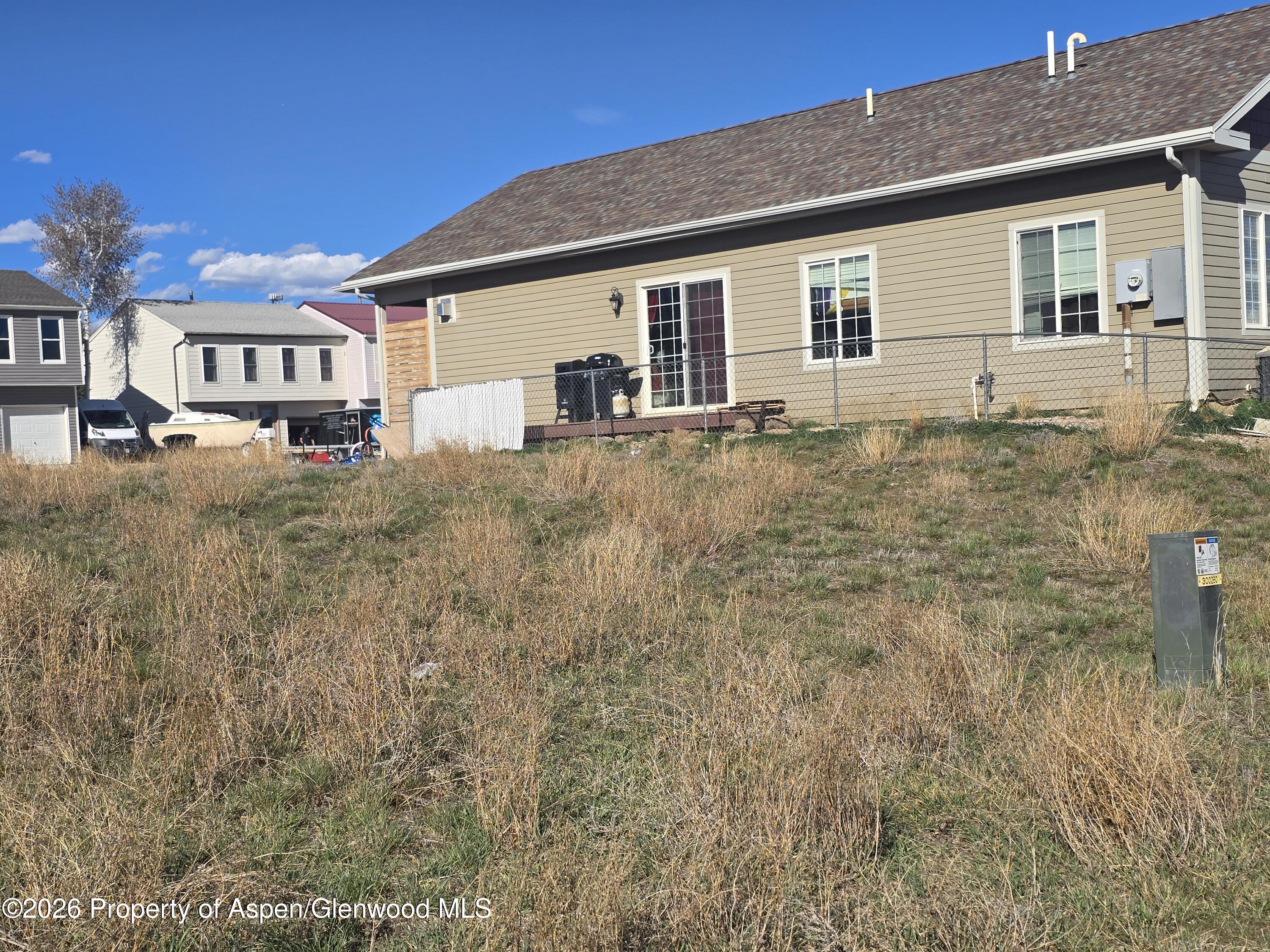 Tbd West 6th Street Craig, CO 81625 - Photo 2 of 5 a front view of a house with a yard