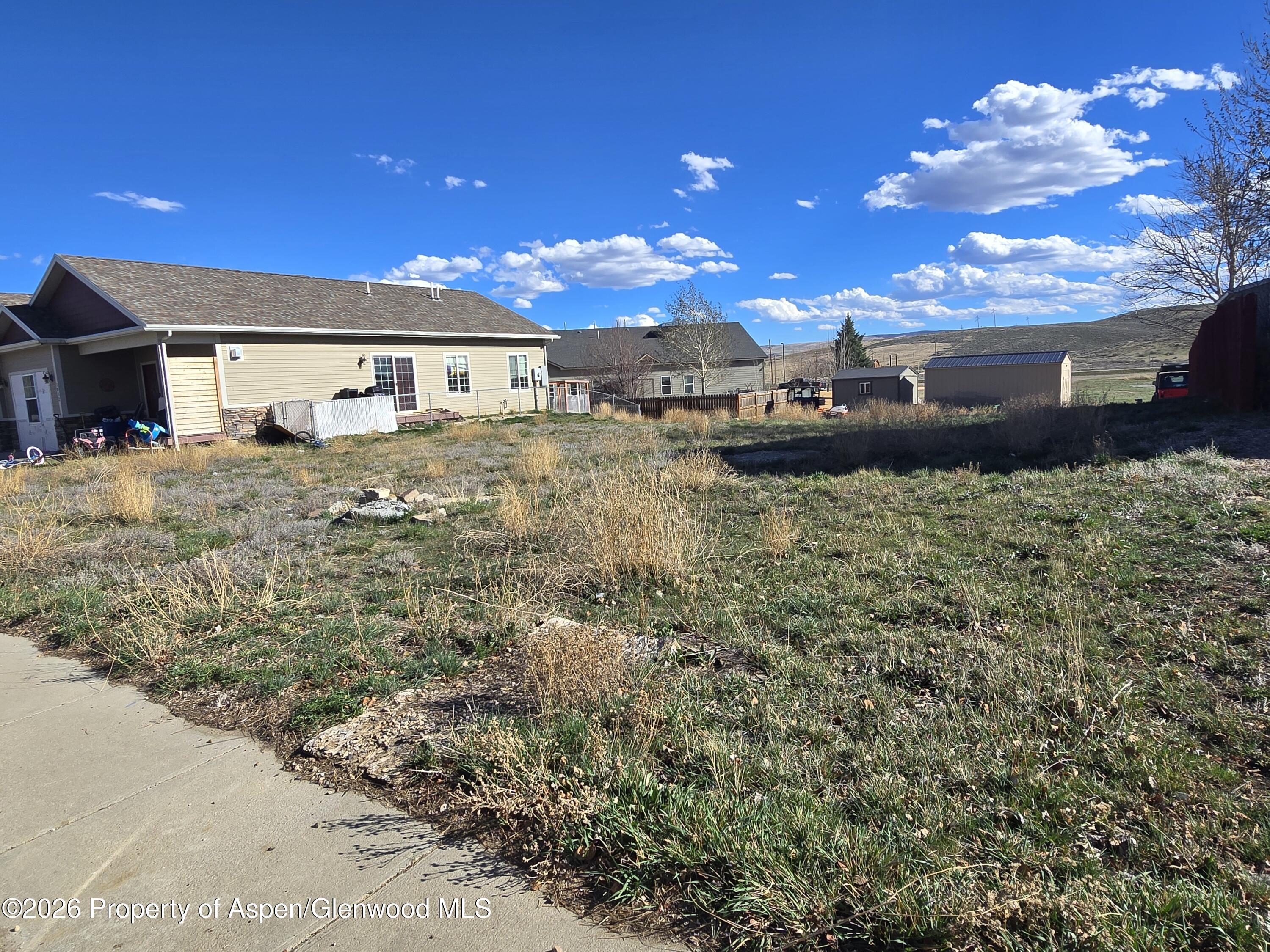 Tbd West 6th Street Craig, CO 81625 - Photo 3 of 5 a view of a house with a yard