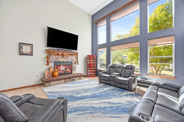 a kitchen with stainless steel appliances granite countertop a sink and a stove