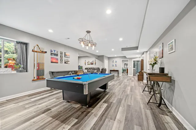 a en suite bathroom with double vanity and a mirror