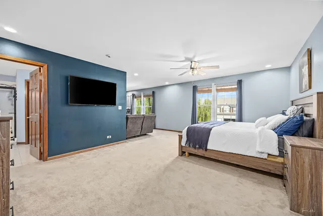 a view of a livingroom with furniture and windows