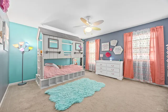 a bathroom with a sink double vanity and shower