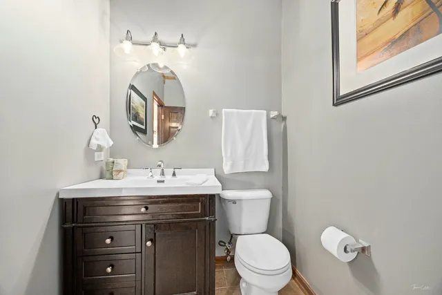 a view of a livingroom with a ceiling fan and a window
