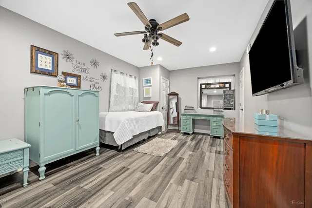 an aerial view of residential house with outdoor space and swimming pool