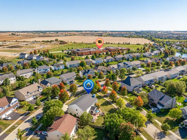 a view of a park with swings and slides