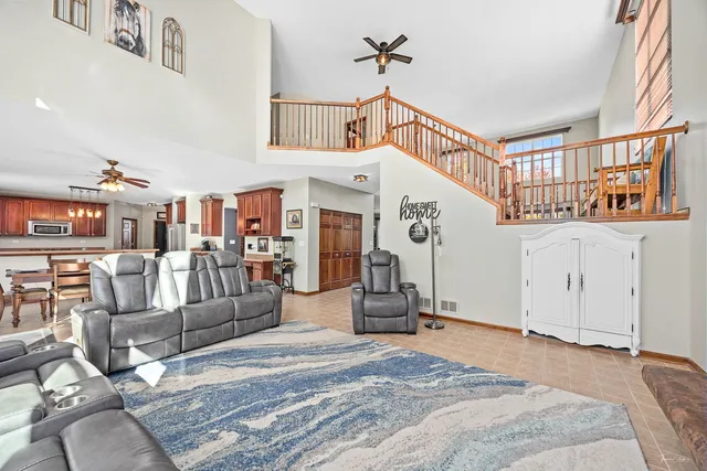 a view of a livingroom with furniture and windows