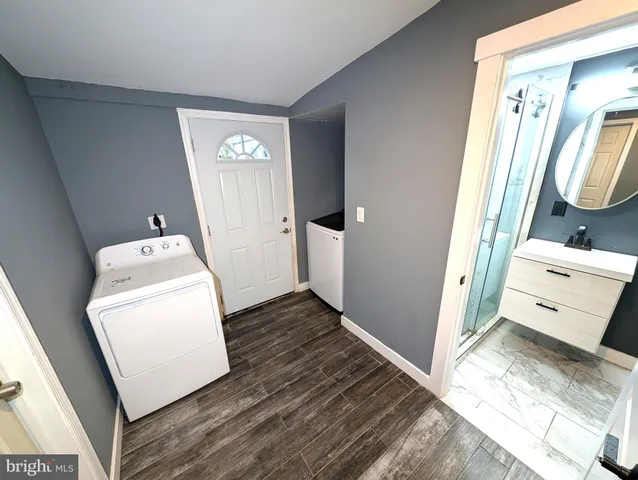 a utility room with dryer and washer