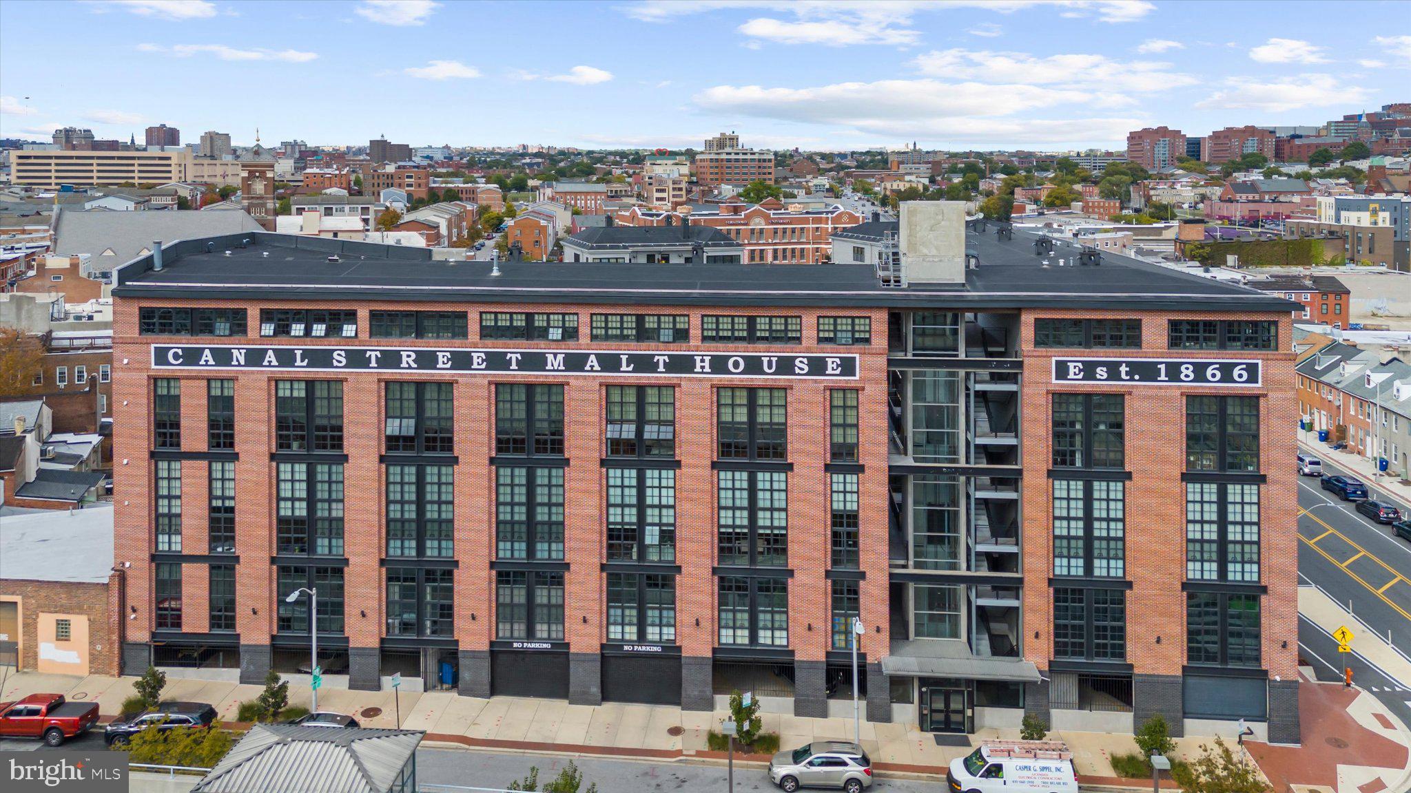 1220 Bank Street, Unit 409 Baltimore, MD 21202 - Photo 2 of 53 a view of a city that has tall buildings