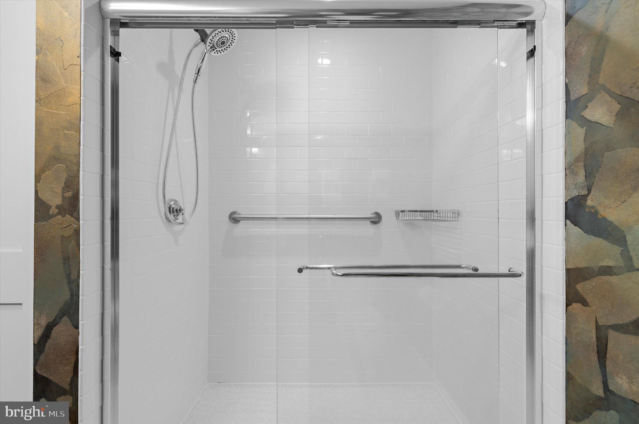 1220 Bank Street, Unit 409 Baltimore, MD 21202 - Photo 29 of 53 a bathroom with a shower