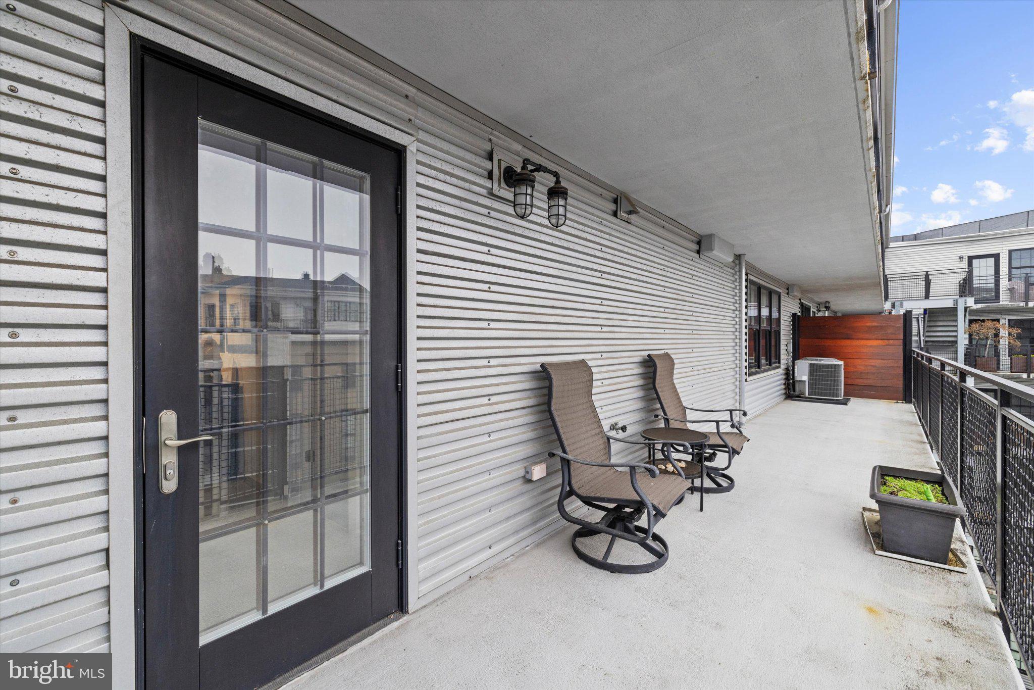 1220 Bank Street, Unit 409 Baltimore, MD 21202 - Photo 43 of 53 a view of yard with patio