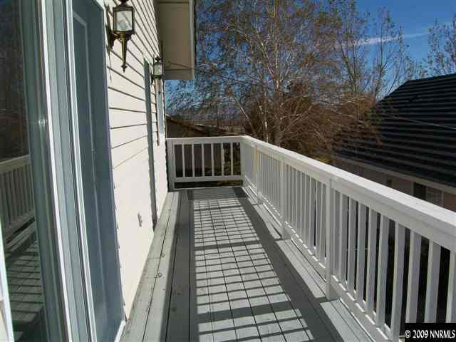 10810 Santa Fe Road Reno, NV 89508 - Photo 8 of 9 a view of balcony with wooden floor