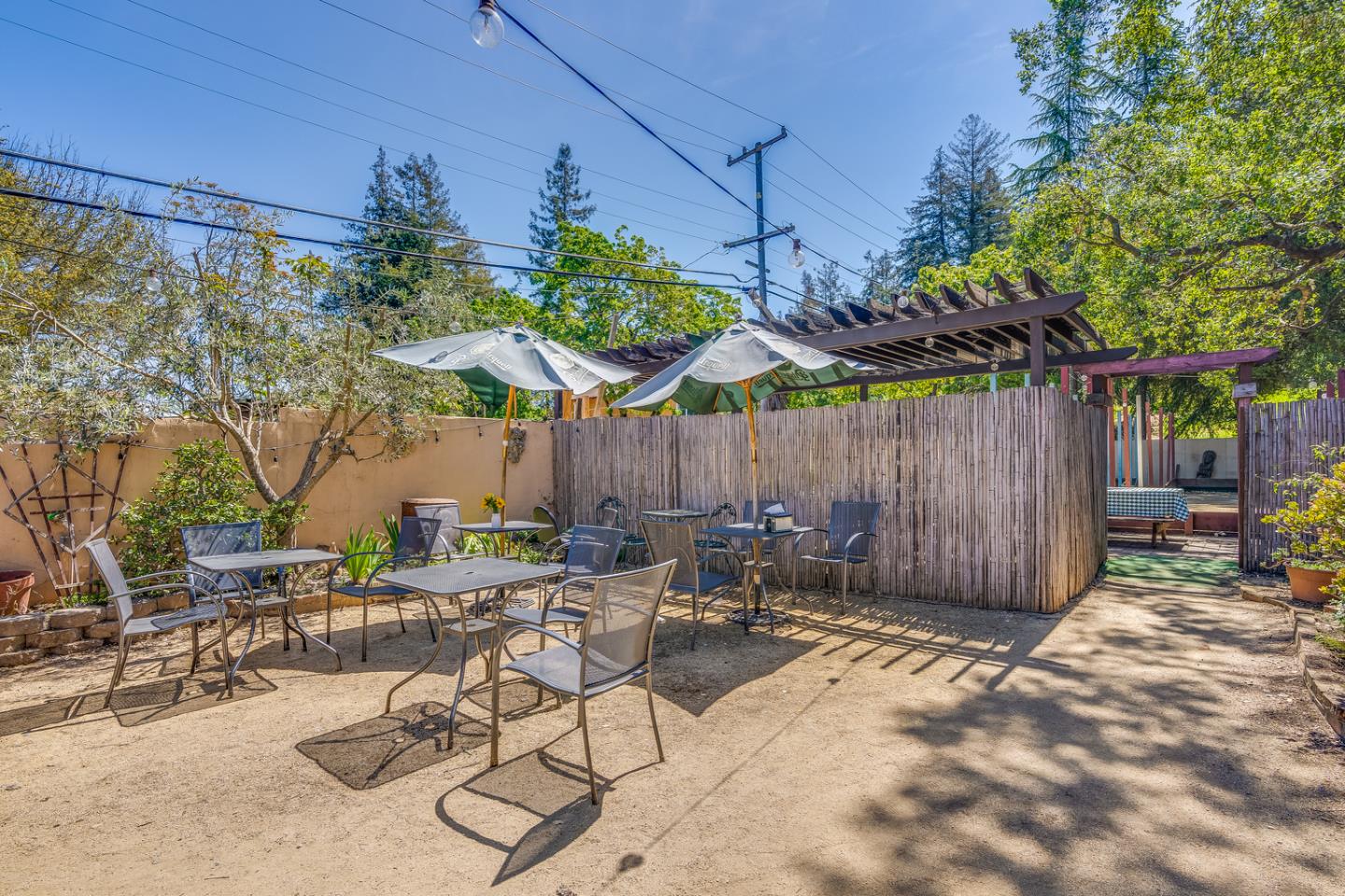 21433 Broadway Road Los Gatos, CA 95033 - Photo 6 of 41 a view of a backyard with sitting area and furniture