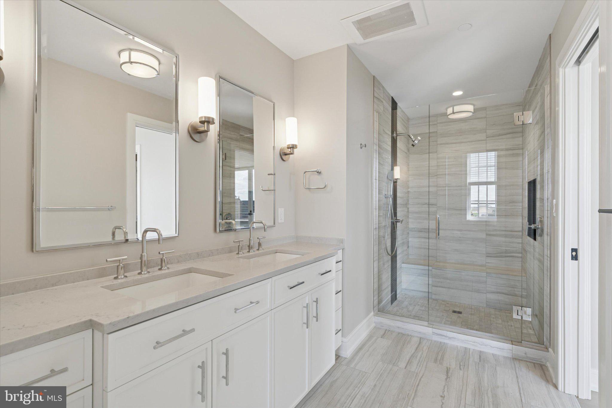 50 North Main Street, Unit 302 Doylestown, PA 18901 - Photo 21 of 38 Sleek modern bathroom oasis.