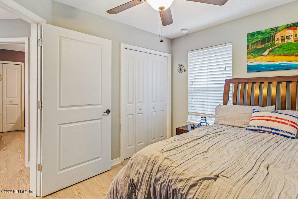 405 2nd Street St. Augustine, FL 32084 - Photo 14 of 49 a bedroom with a bed and a window