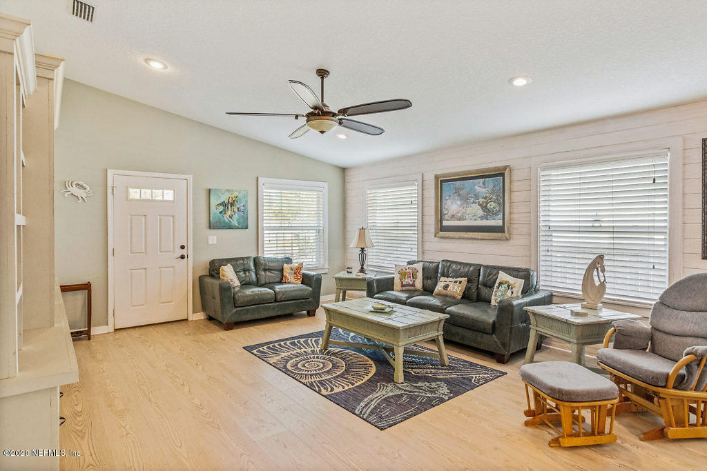 405 2nd Street St. Augustine, FL 32084 - Photo 27 of 49 a living room with furniture and a large window