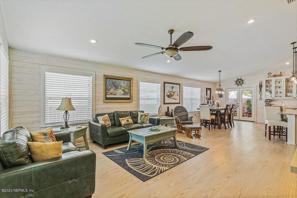405 2nd Street St. Augustine, FL 32084 - Photo 28 of 49 a living room with furniture and a large window