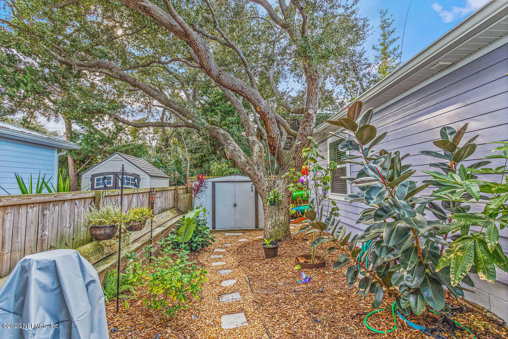 405 2nd Street St. Augustine, FL 32084 - Photo 40 of 49 a view of a chair and table in front of a house