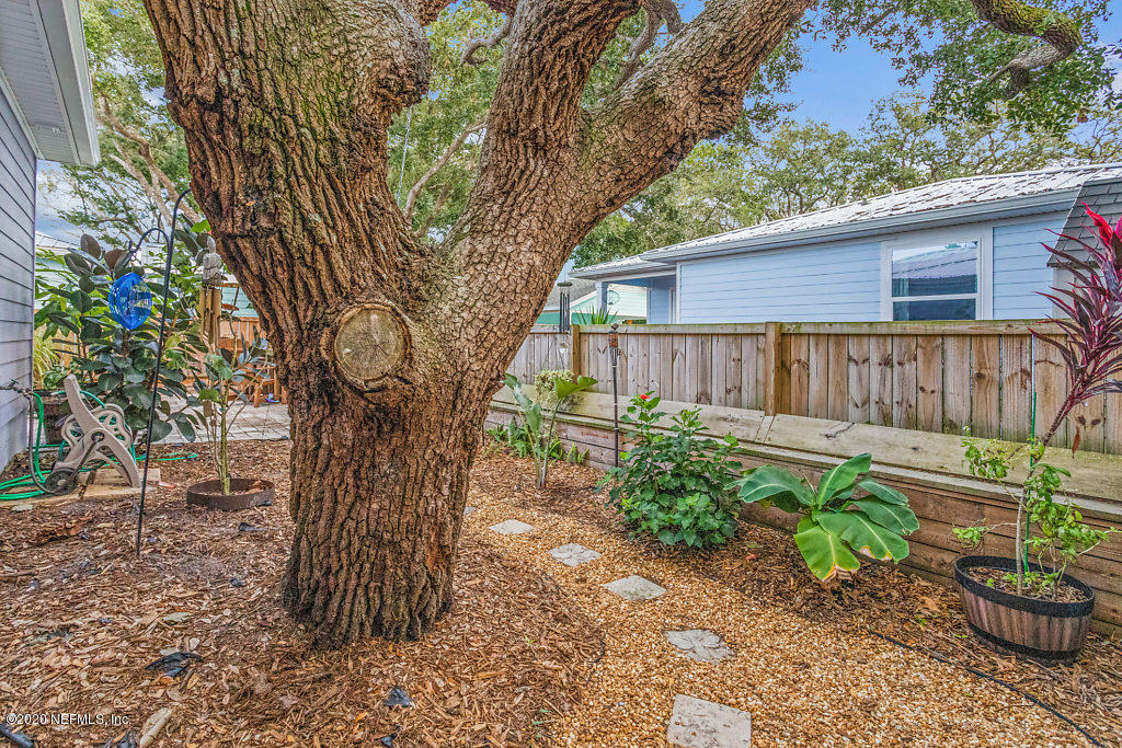 405 2nd Street St. Augustine, FL 32084 - Photo 43 of 49 a view of a wooden house with a yard