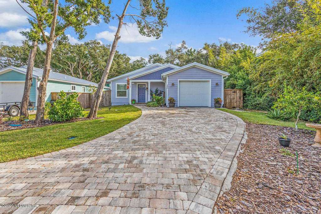 405 2nd Street St. Augustine, FL 32084 - Photo 10 of 49 a view of a house with a yard and large tree