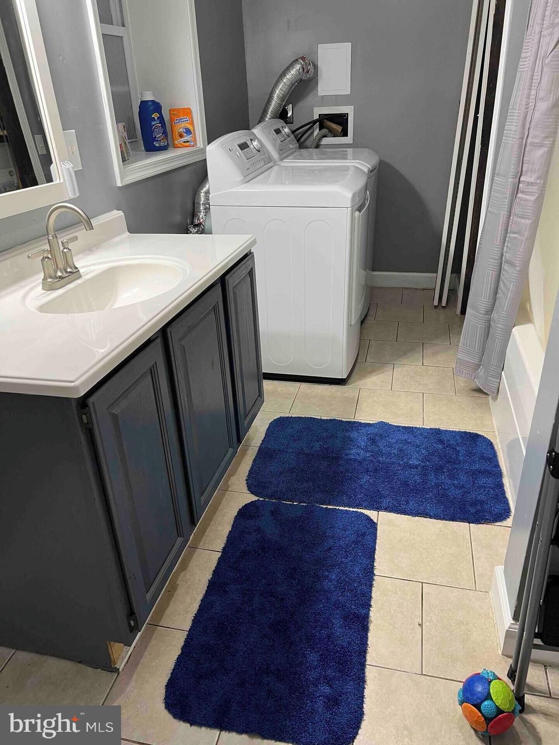 36078 Carver Road Chaptico, MD 20621 - Photo 11 of 14 a bathroom with a sink and a mirror