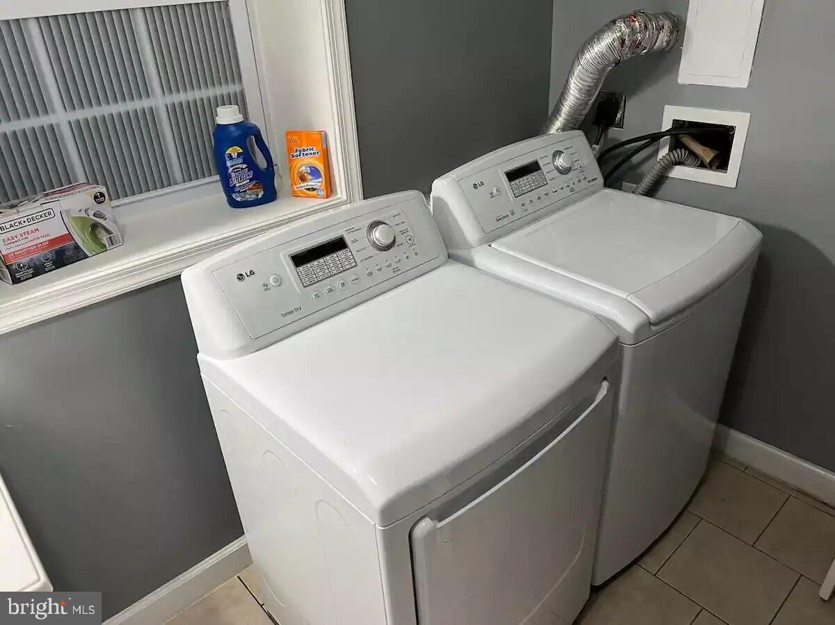 36078 Carver Road Chaptico, MD 20621 - Photo 5 of 14 a utility room with dryer and washer