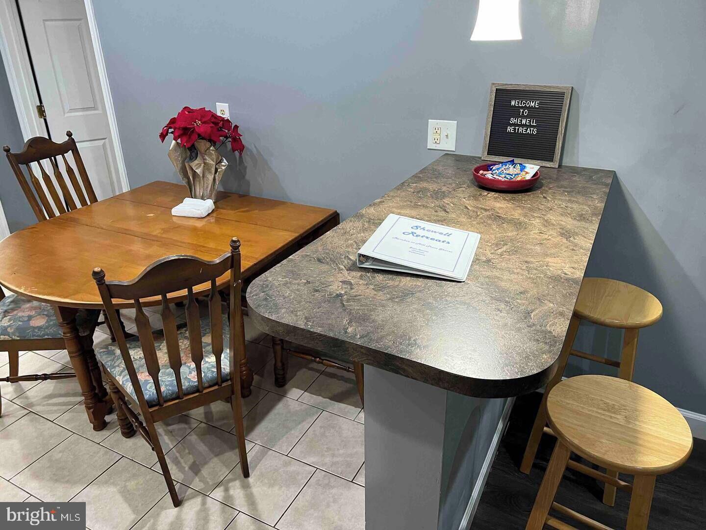 36078 Carver Road Chaptico, MD 20621 - Photo 6 of 14 a view of a dining room with furniture and wooden floor