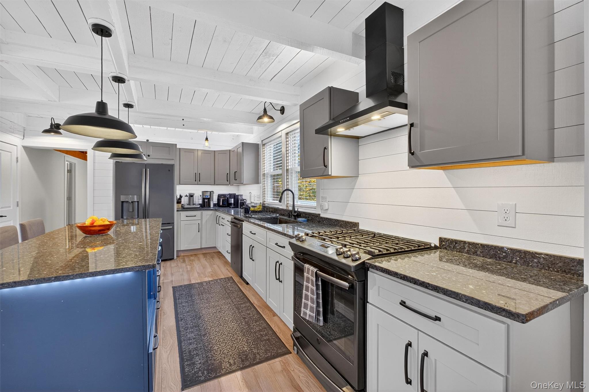 618 Salt Point Turnpike Poughkeepsie, NY 12601 - Photo 12 of 38 a kitchen with stainless steel appliances granite countertop a stove and a sink