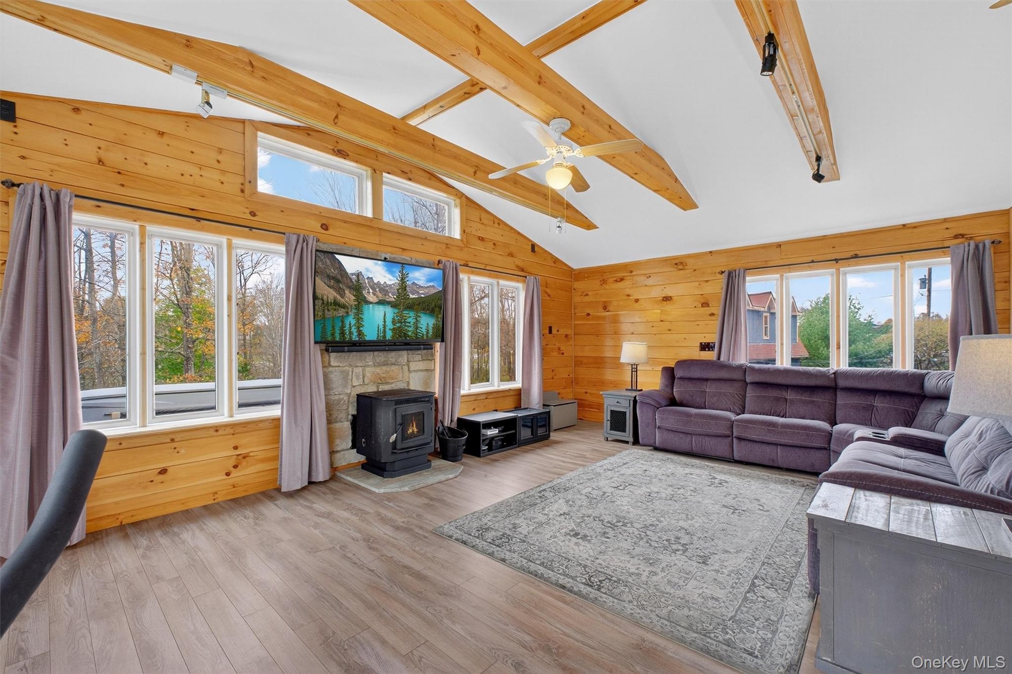 618 Salt Point Turnpike Poughkeepsie, NY 12601 - Photo 15 of 38 a bedroom with furniture and large windows