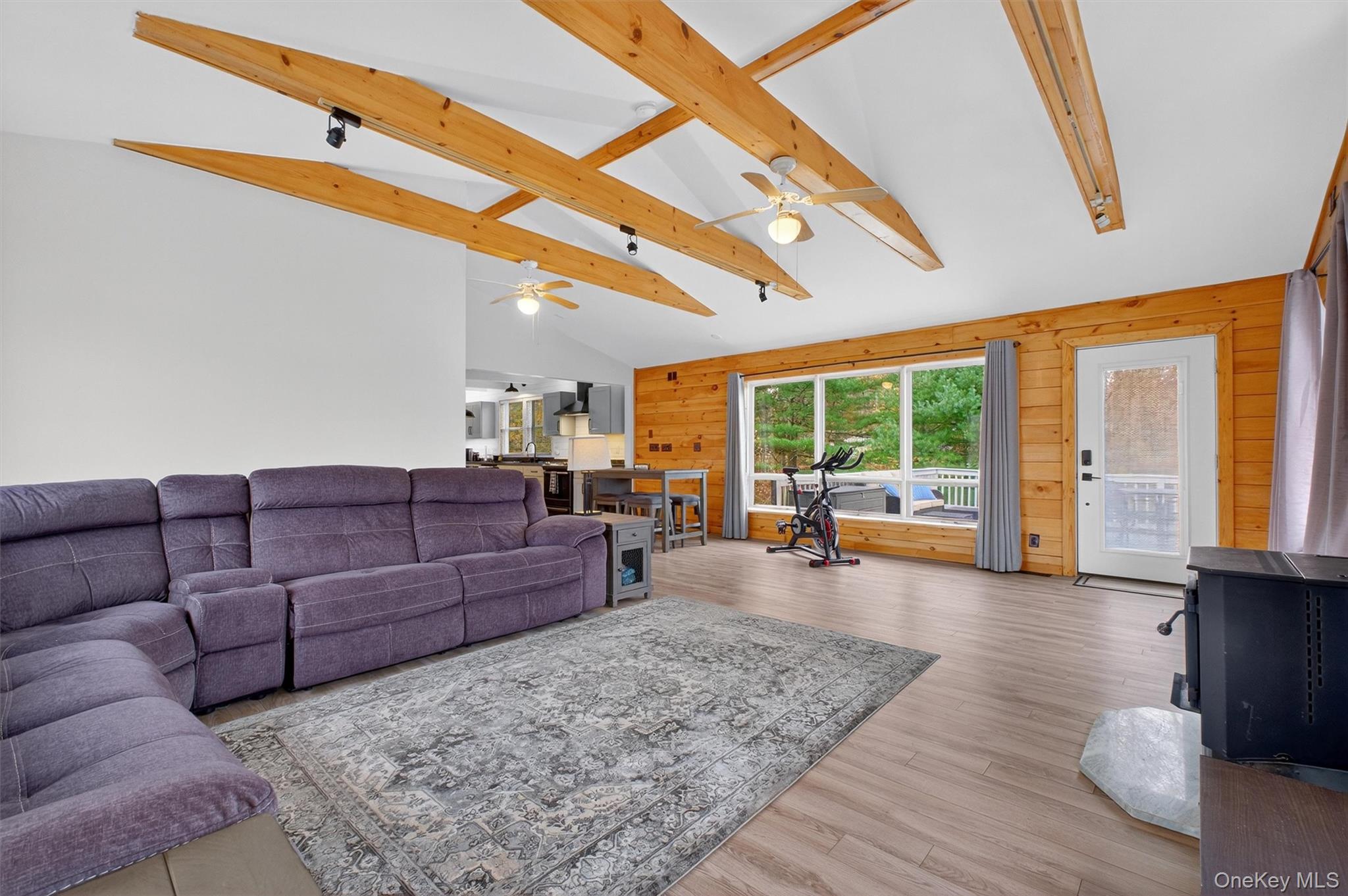 618 Salt Point Turnpike Poughkeepsie, NY 12601 - Photo 16 of 38 a living room with furniture and a large window