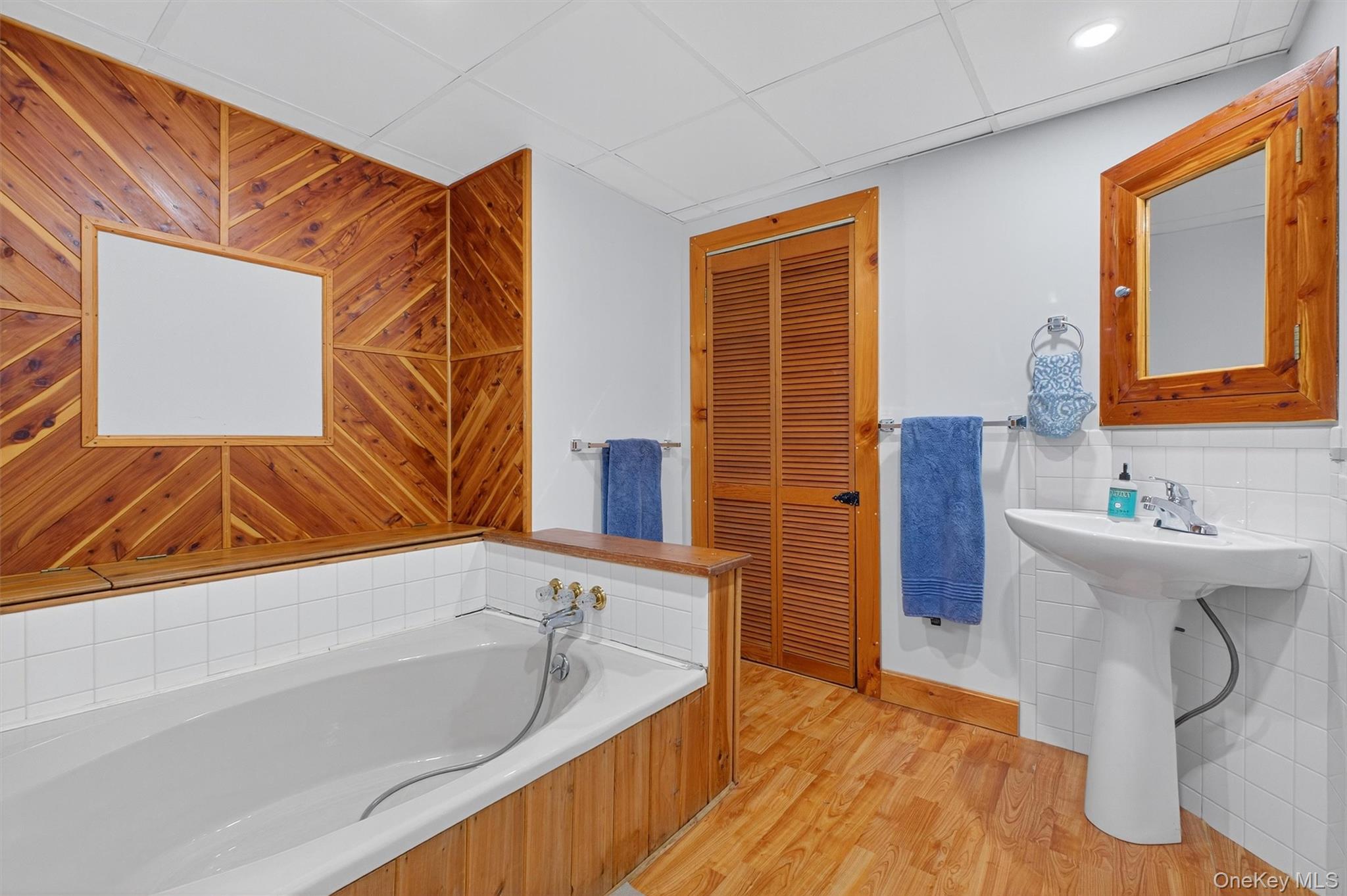 618 Salt Point Turnpike Poughkeepsie, NY 12601 - Photo 23 of 38 a bathroom with a bathtub and a sink