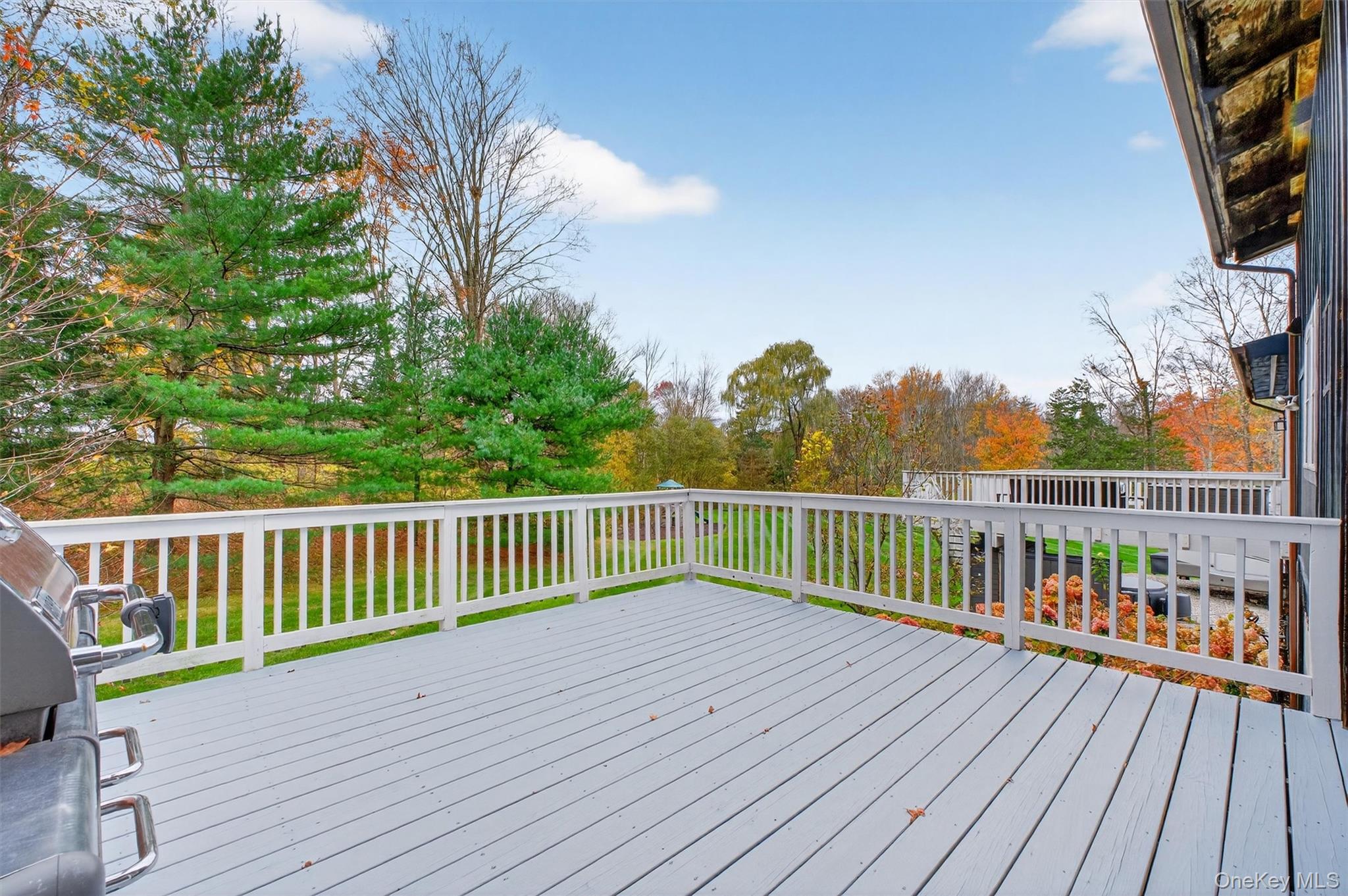 618 Salt Point Turnpike Poughkeepsie, NY 12601 - Photo 27 of 38 a view of deck with a table and chairs and wooden floor