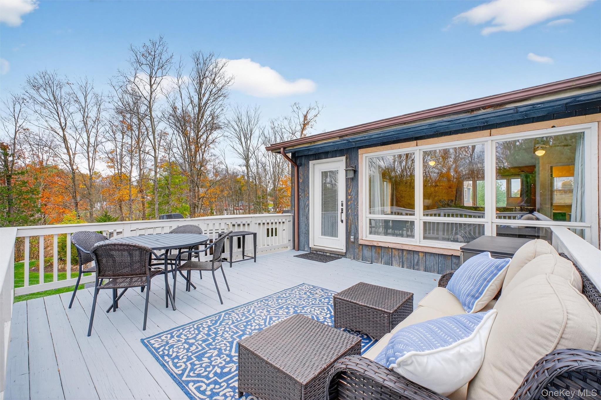 618 Salt Point Turnpike Poughkeepsie, NY 12601 - Photo 28 of 38 a view of a patio with couches chairs and wooden floor