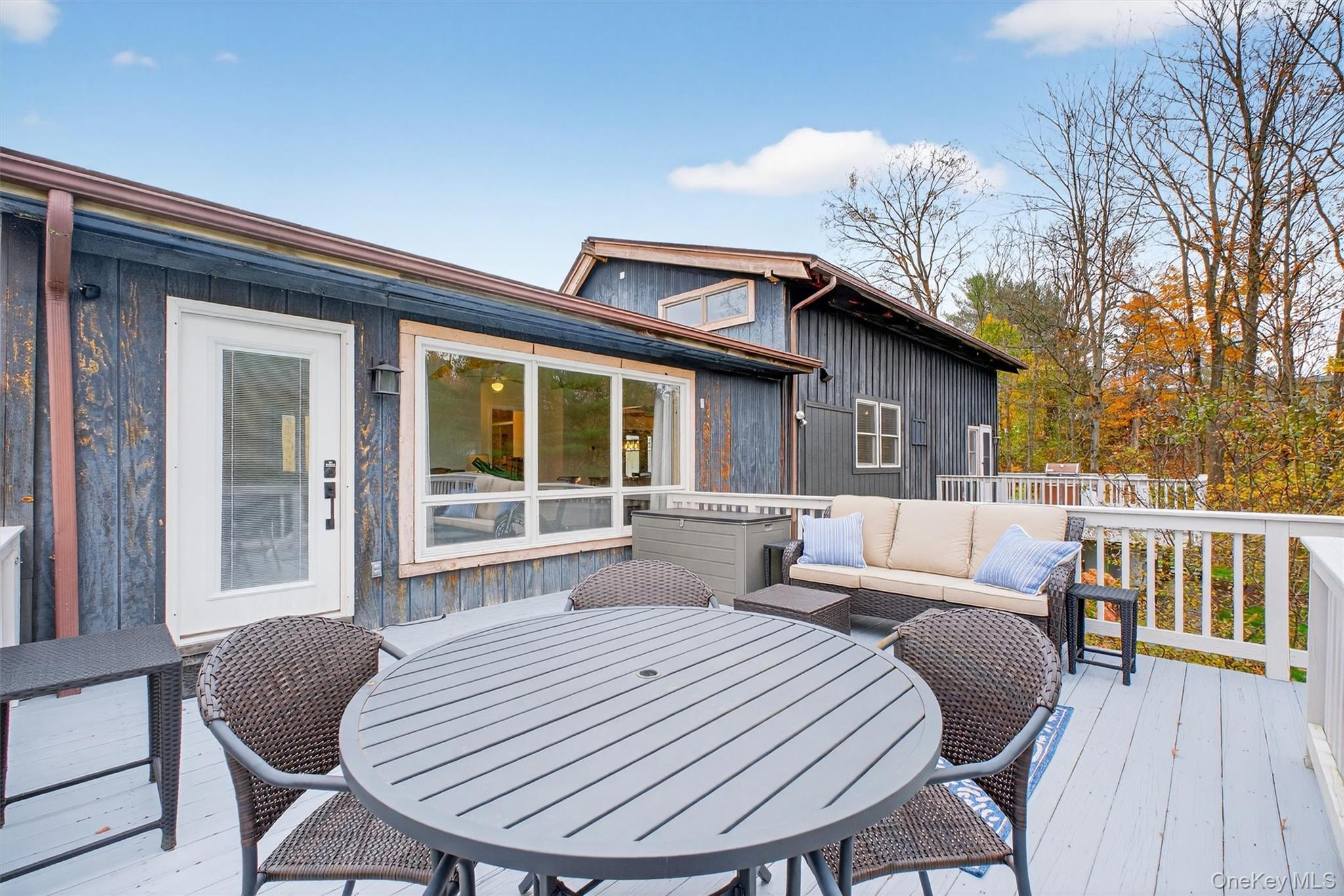 618 Salt Point Turnpike Poughkeepsie, NY 12601 - Photo 29 of 38 a view of a patio with a table and chairs