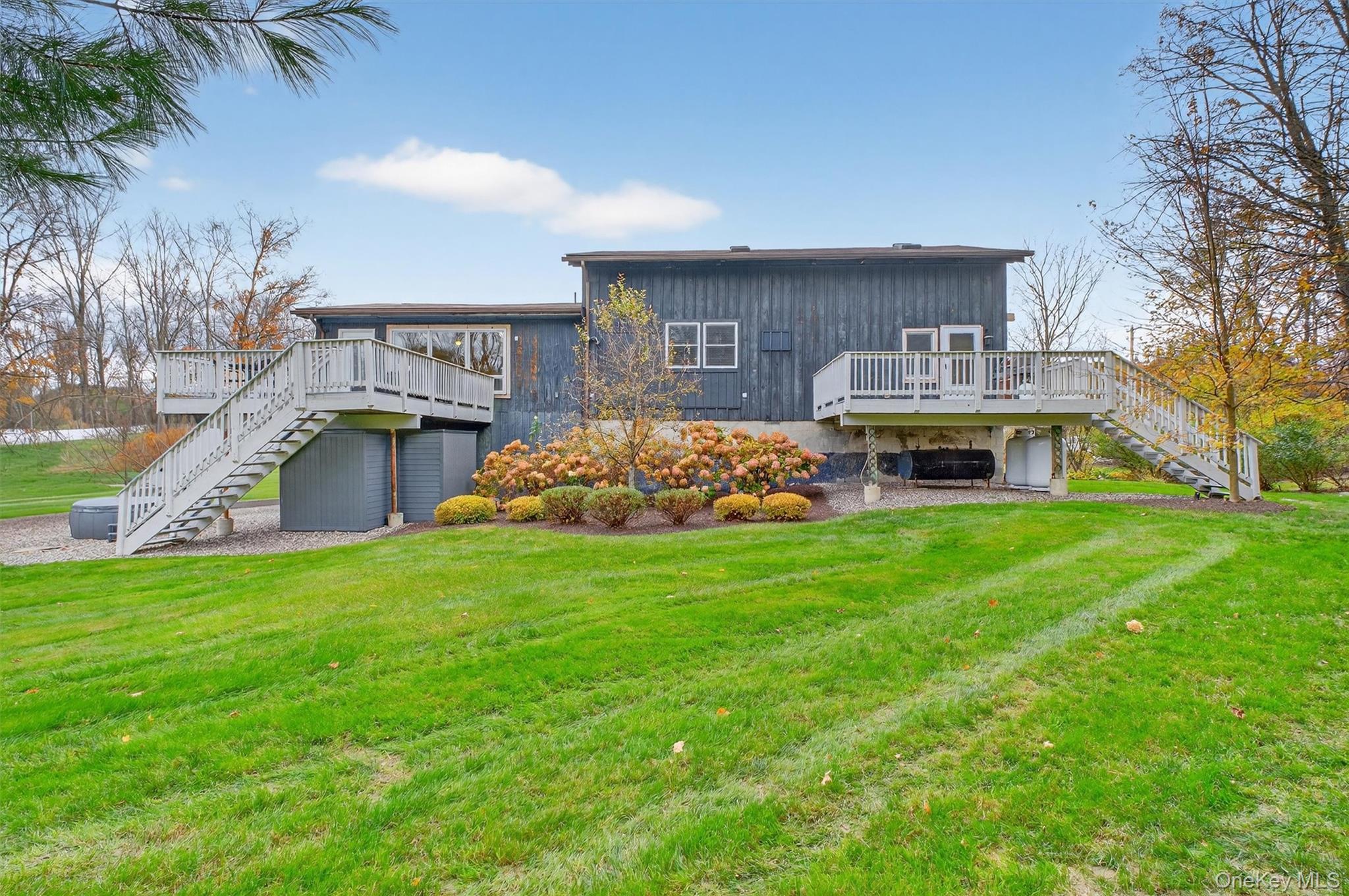 618 Salt Point Turnpike Poughkeepsie, NY 12601 - Photo 32 of 38 a front view of a house with a garden