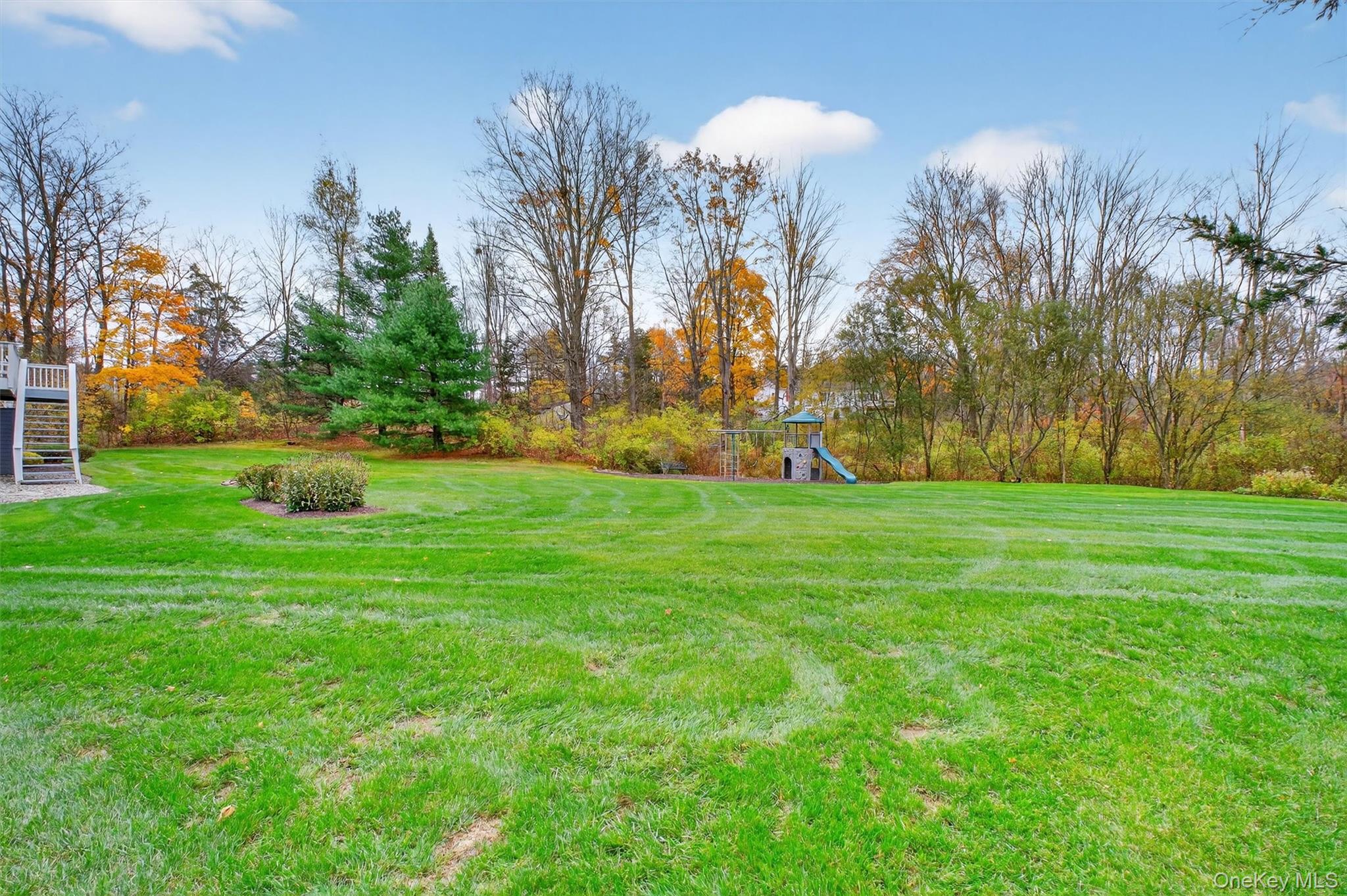 618 Salt Point Turnpike Poughkeepsie, NY 12601 - Photo 33 of 38 a front view of a house with a yard and trees