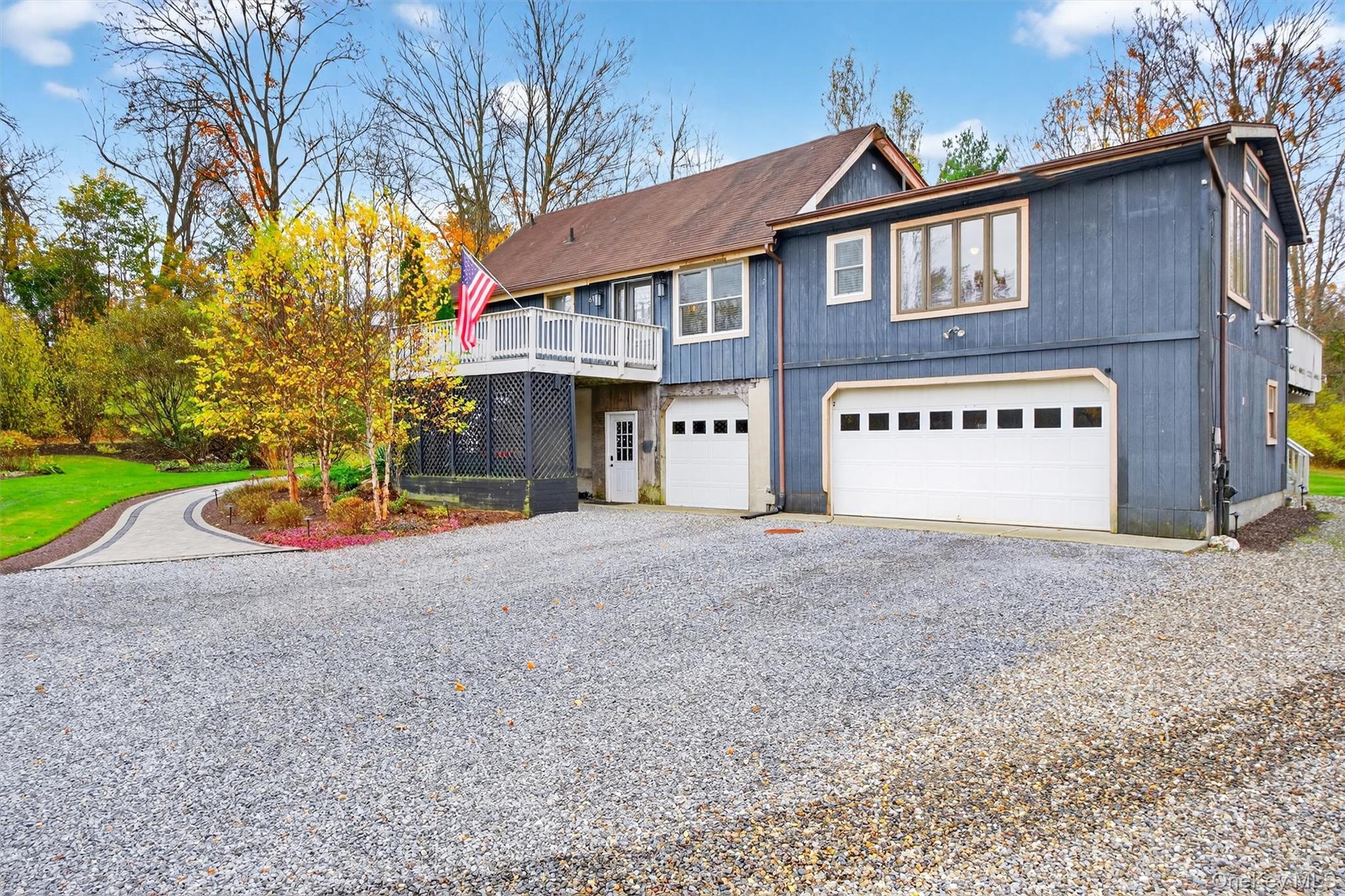 618 Salt Point Turnpike Poughkeepsie, NY 12601 - Photo 6 of 38 a view of a house with a yard and garage