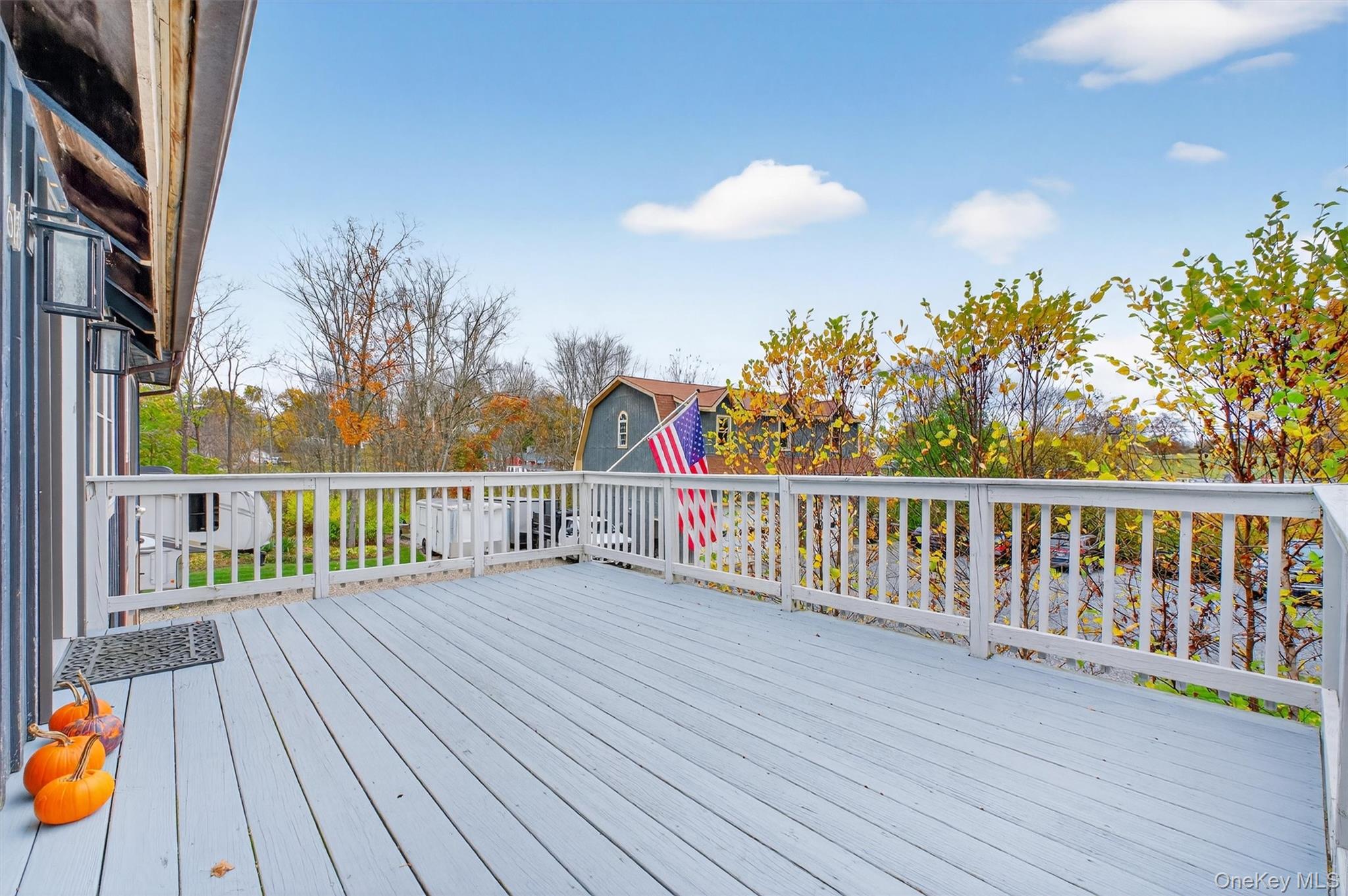 618 Salt Point Turnpike Poughkeepsie, NY 12601 - Photo 7 of 38 a view of a balcony with wooden floor