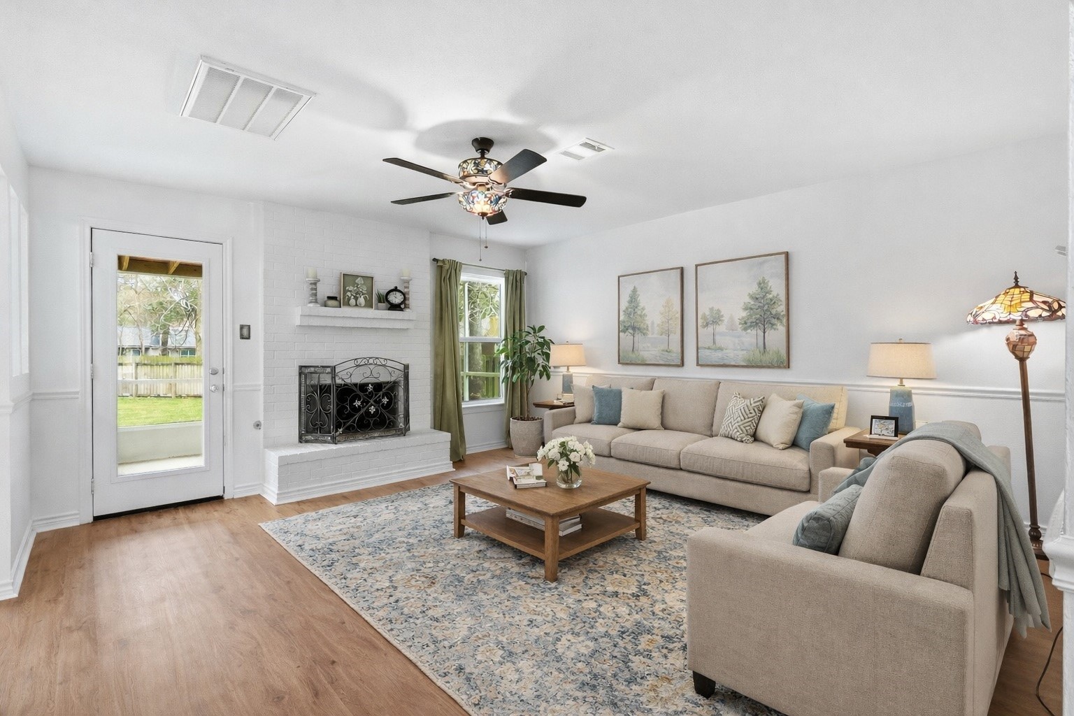 10 East Broken Oak Court Spring, TX 77381 - Photo 3 of 47 Virtually Staged. The beautiful stained glass ceiling fan, however, is a wonderful piece of this lovely Family Room.