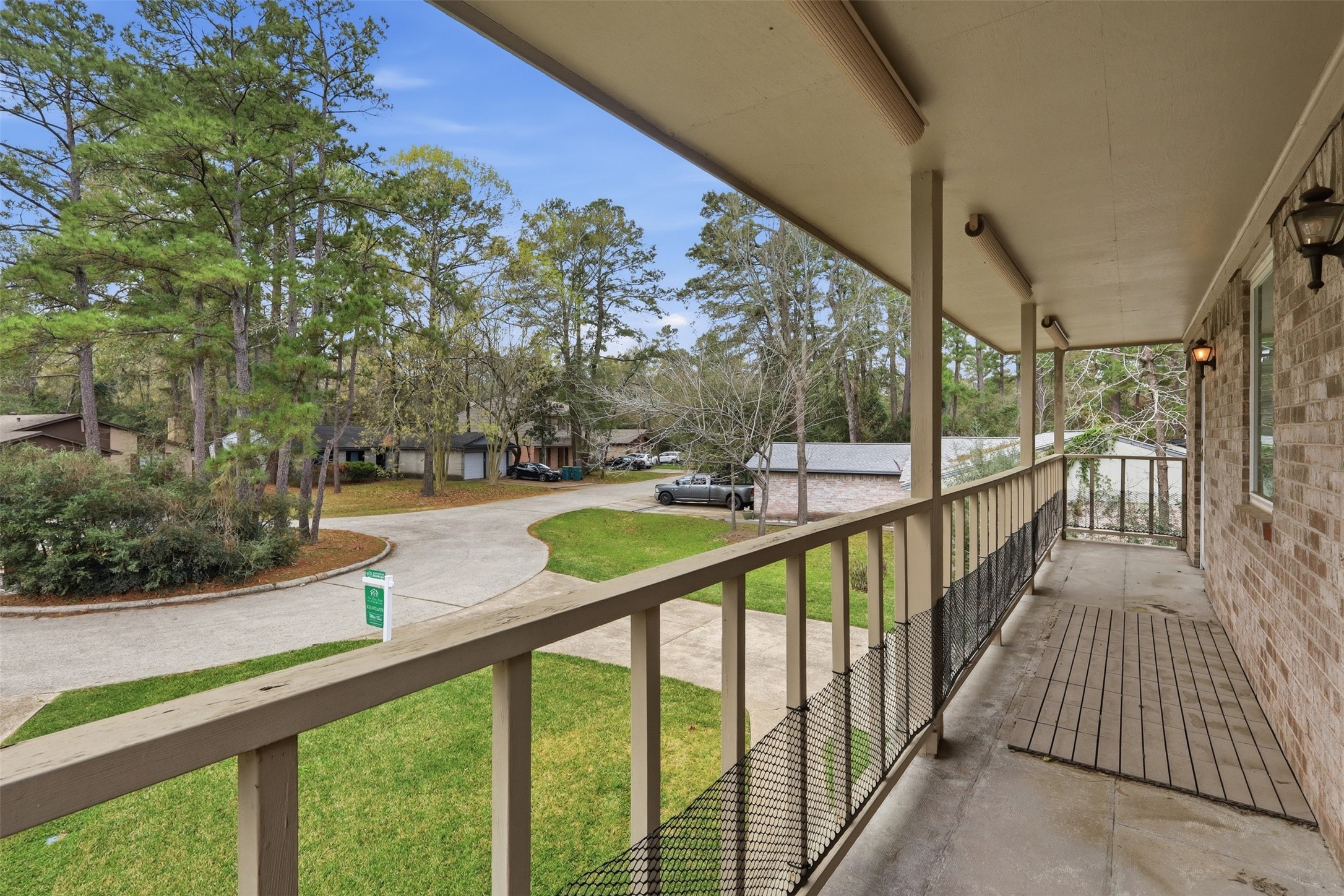 10 East Broken Oak Court Spring, TX 77381 - Photo 35 of 47 Second story balcony. Access to the primary and a secondary bedroom, sun shades, and plenty of room for a patio set up.