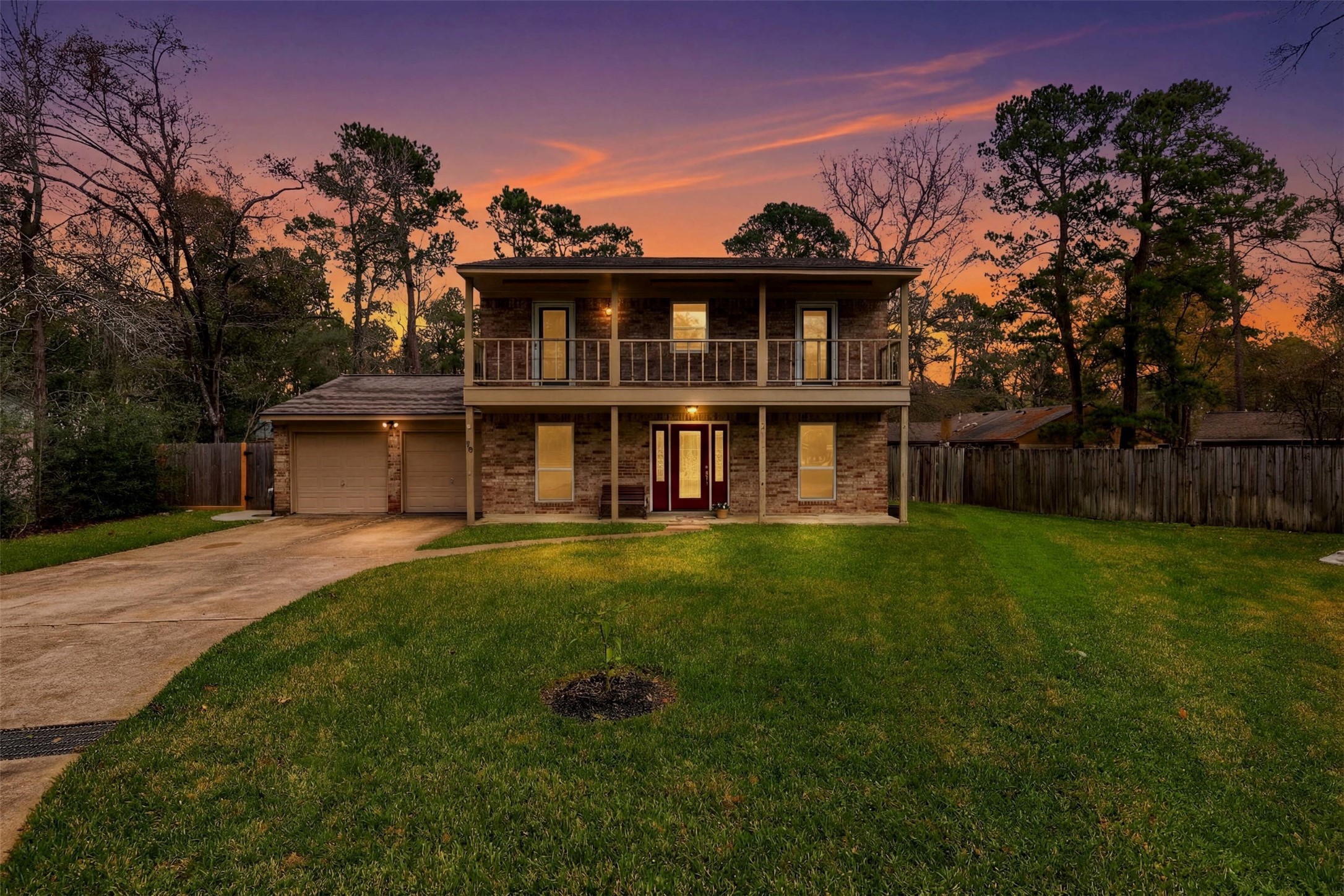 10 East Broken Oak Court Spring, TX 77381 - Photo 5 of 47 Charming two-story brick home with a spacious front lawn and a welcoming driveway. Features a two-car garage and a balcony!