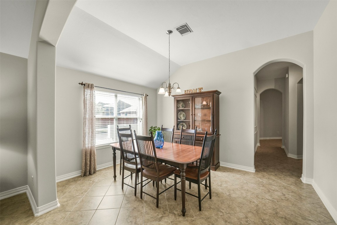 25103 Diamond Ranch Drive Katy, TX 77494 - Photo 8 of 34 Enjoy holiday meals and special occasions in the formal dining room.