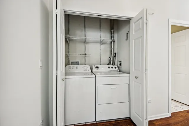 a utility room with dryer and washer
