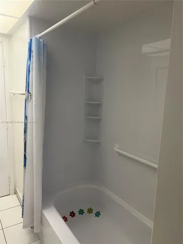 a bathroom with a bathtub
