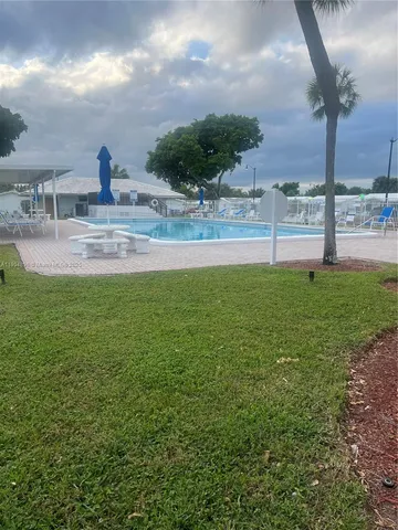 an outdoor space with swimming pool