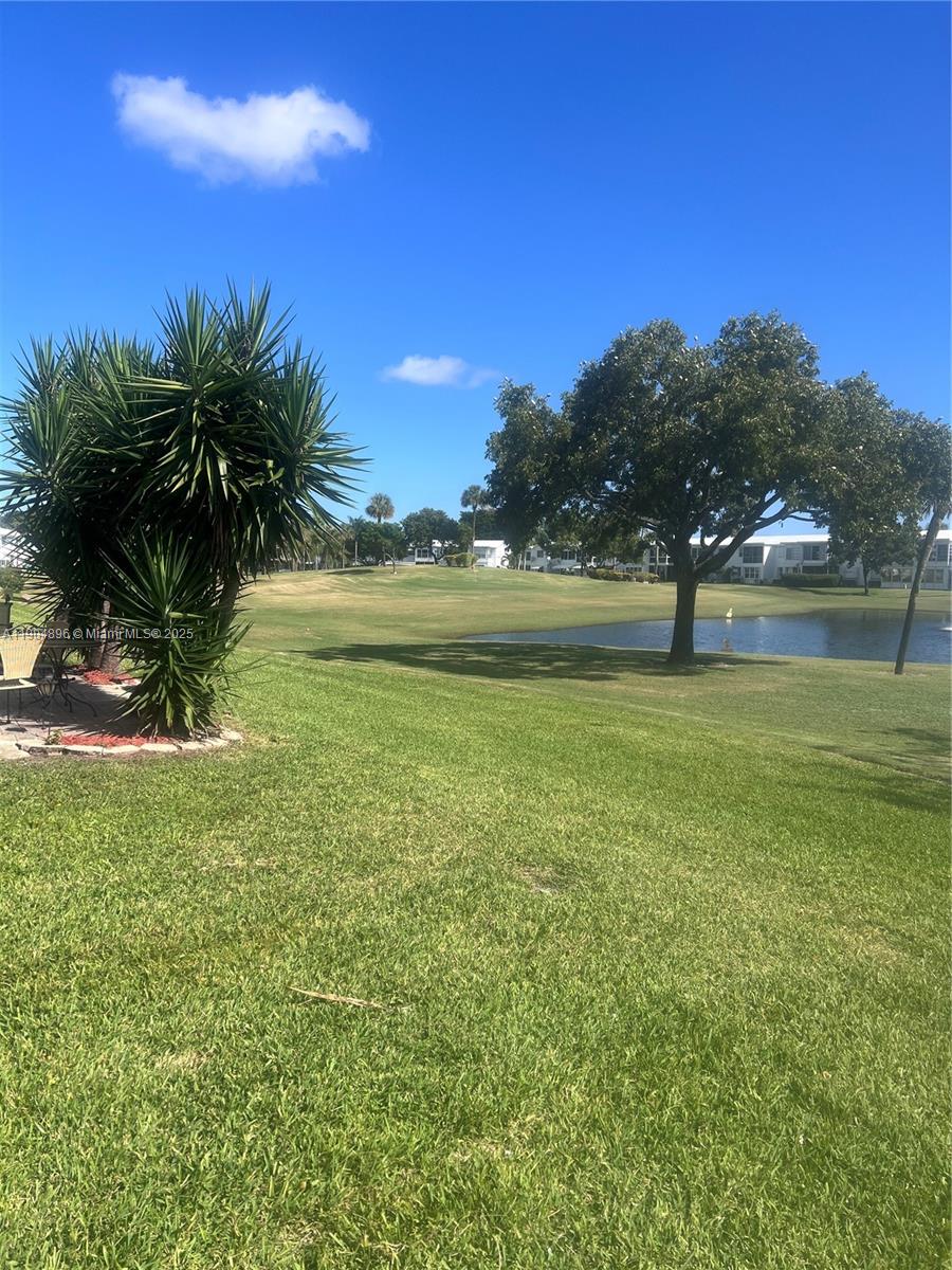 2501 West Golf Boulevard, Unit 128 Pompano Beach, FL 33064 - Photo 44 of 51 a view of an ocean from a yard