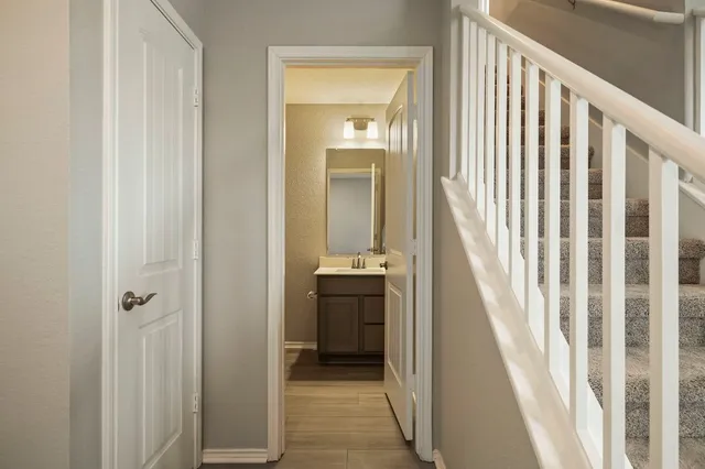 a view of a hallway view with staircase
