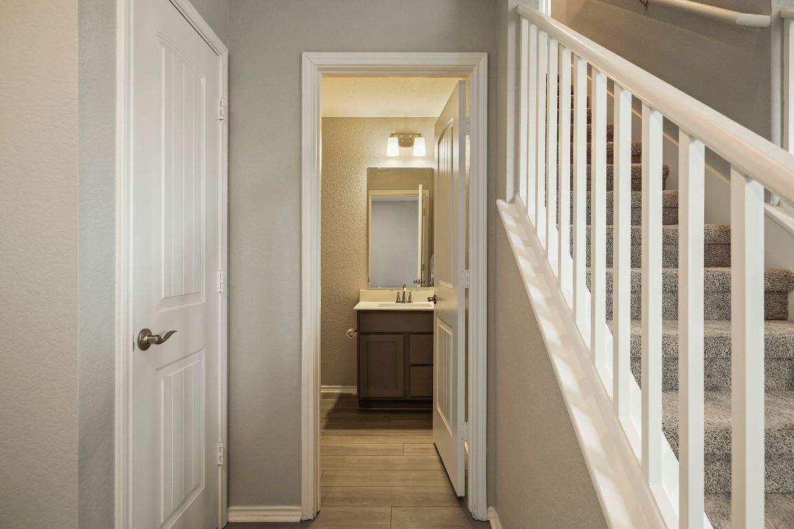 19417 James Carter Jr Street Manor, TX 78653 - Photo 17 of 37 a view of a hallway view with staircase