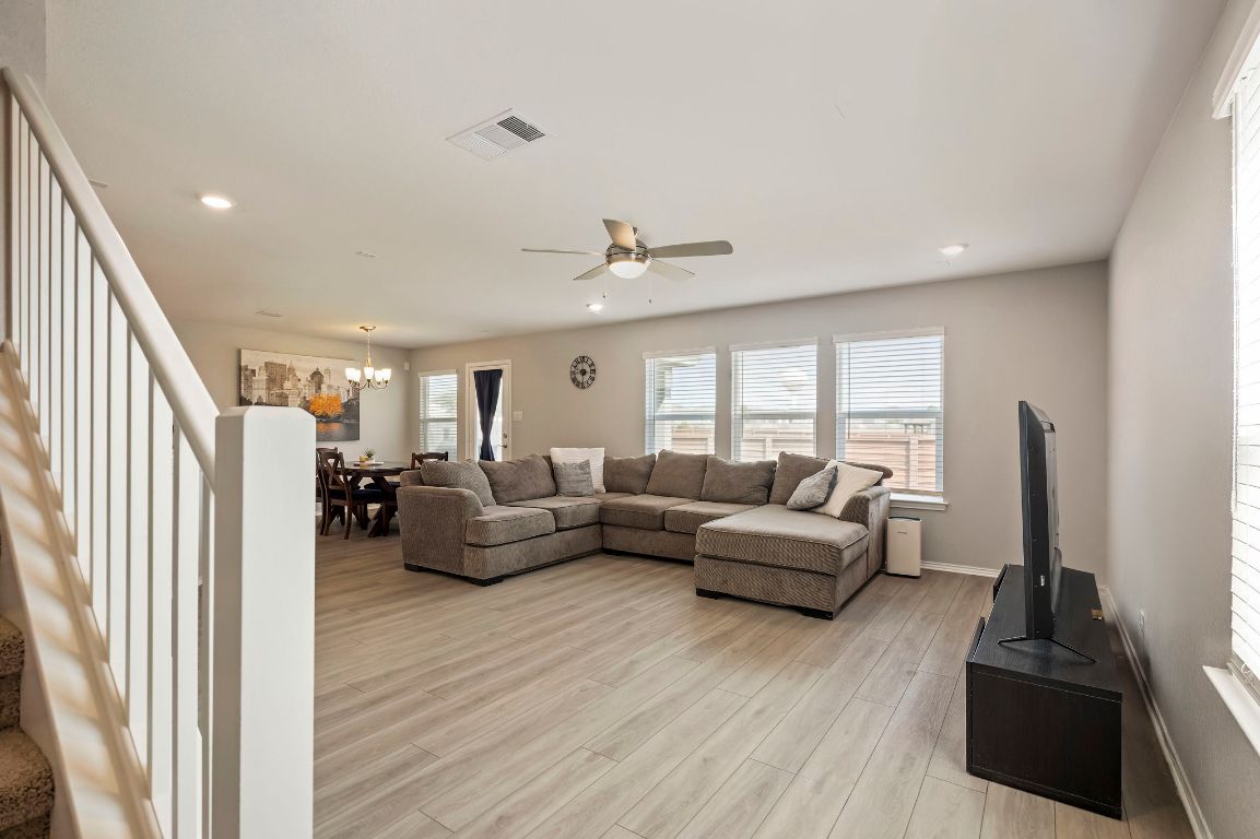 19417 James Carter Jr Street Manor, TX 78653 - Photo 3 of 37 a living room with furniture and a flat screen tv