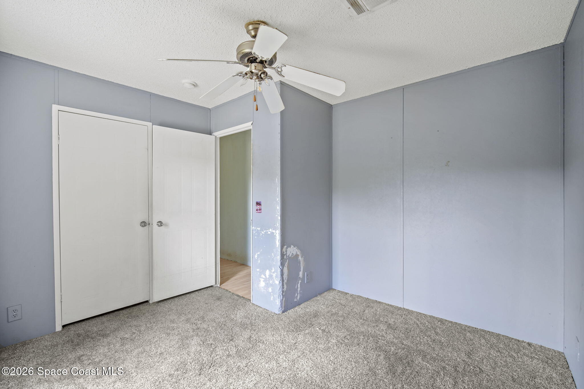 3918 East Ridgewood Drive Cocoa, FL 32926 - Photo 19 of 27 a view of an empty room and closet area