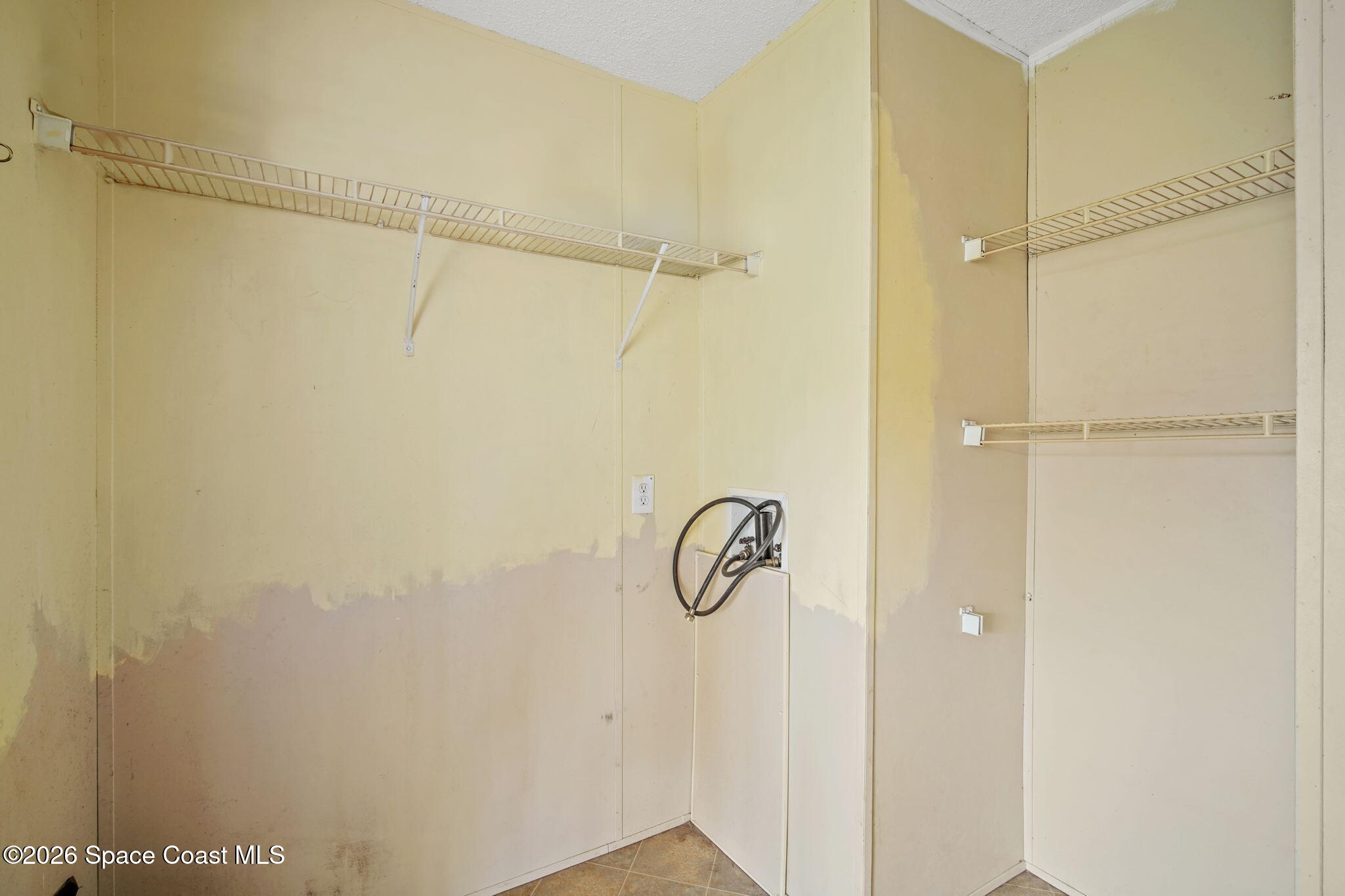 3918 East Ridgewood Drive Cocoa, FL 32926 - Photo 23 of 27 a bathroom with a shower